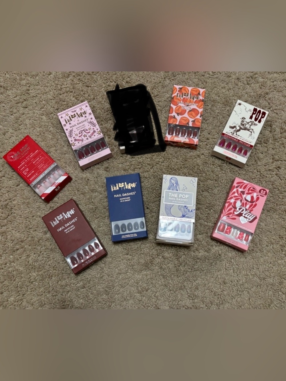 8 sets of brand new Red Aspen nails. Each box includes glue, a file & many sizes